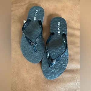 Brand new, never worn — COACH flip flop
size 7/8